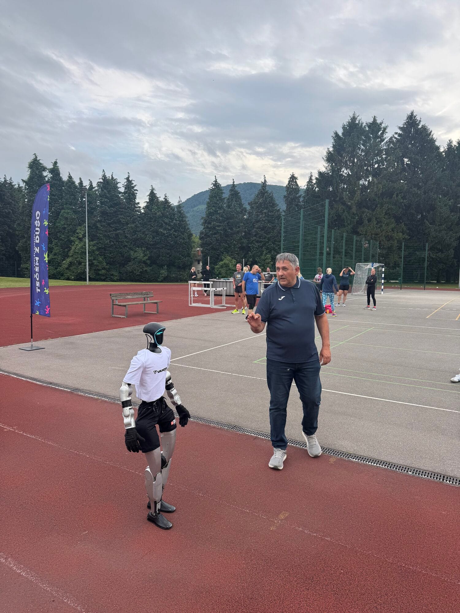 Humanoid robot Jože running on the athletics track in Slovenske Konjice