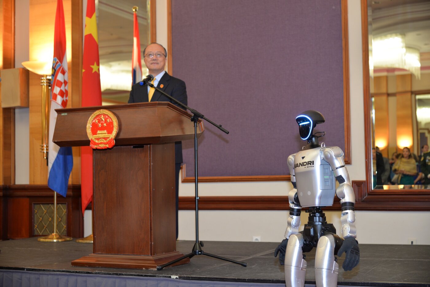 Tonka on stage during the remarks at the reception