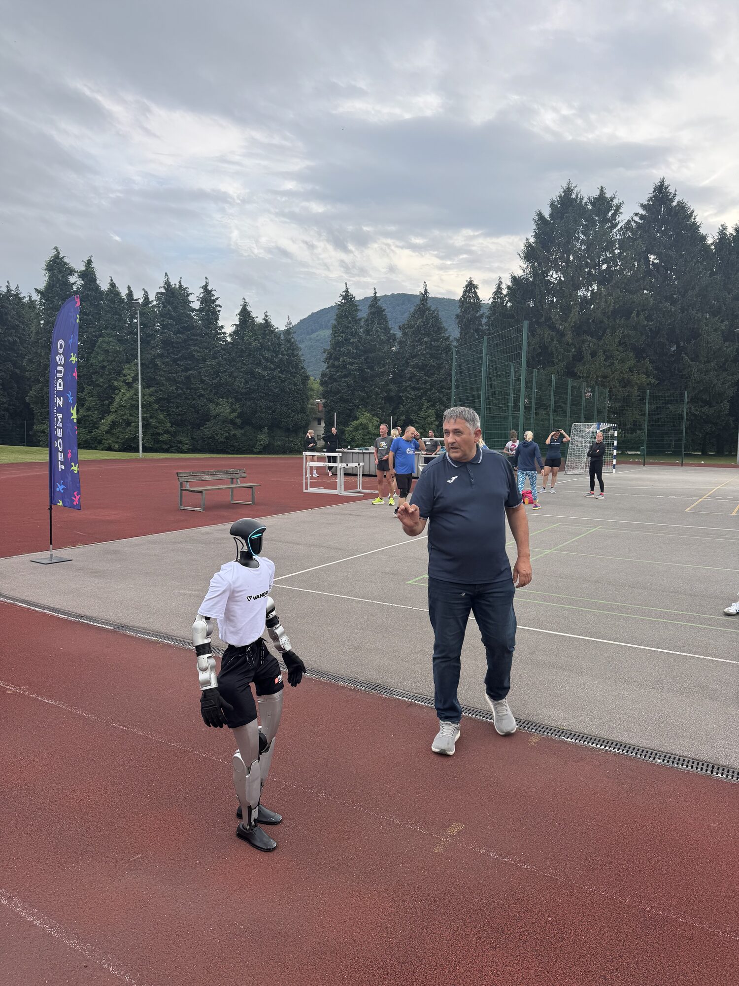 Humanoid robot Jože running on the athletics track in Slovenske Konjice